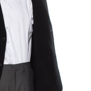 Theory Wool Jacket
Black
Satin Lining
CollarPatch Pockets & Button Closure